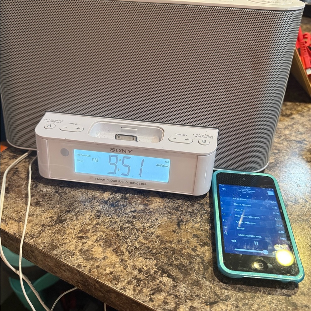 Sony White Alarm Clock Radio and Ipad with lots of music